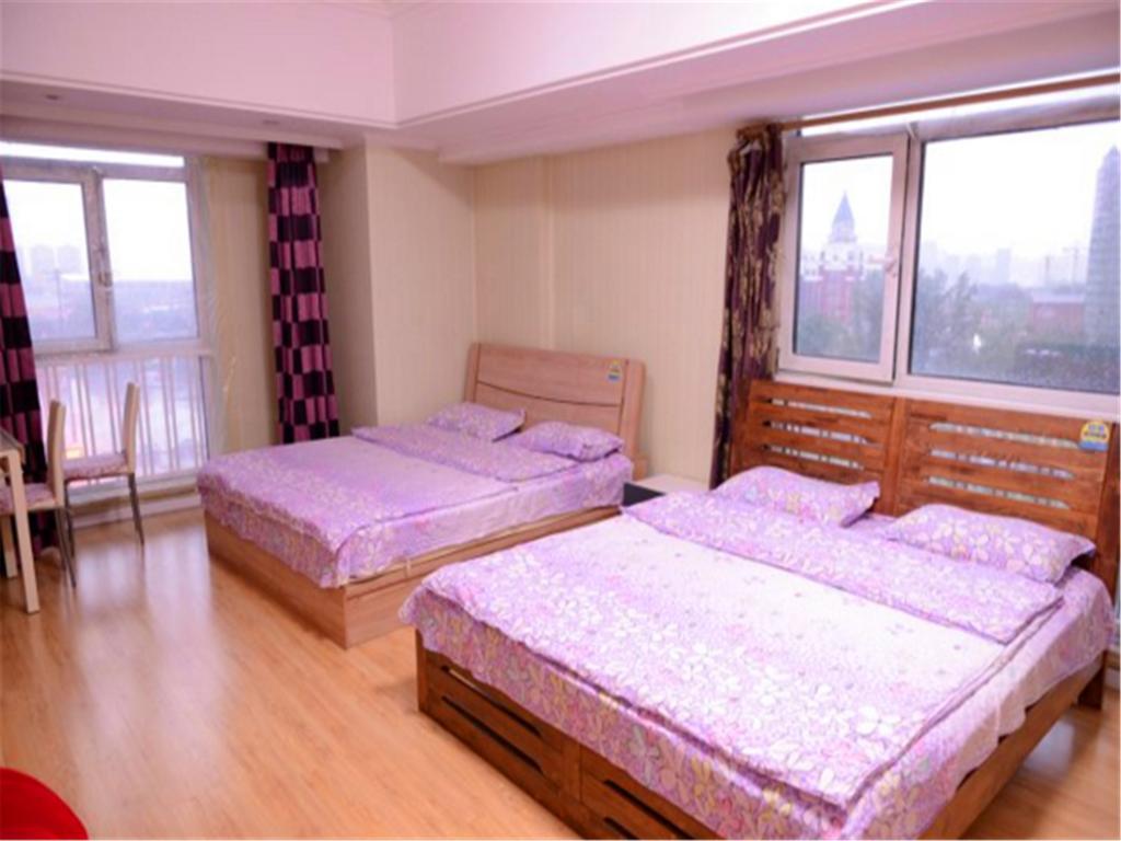 Green Express Apartment Harbin West Railway Station Room photo